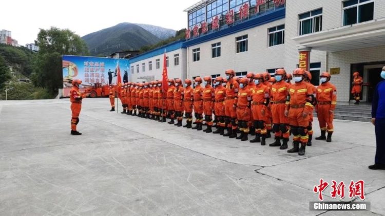 Xi
