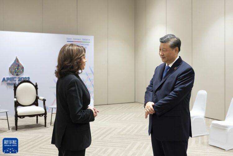 Xi
