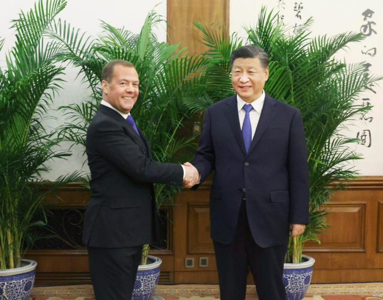 Xi