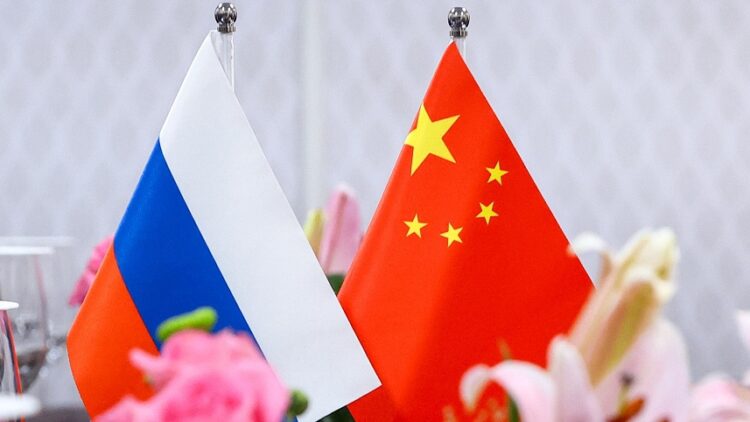 Kasar Sin INDIA, NEW DELHI - MARCH 2, 2023: Flags of Russia and China are seen during a meeting between Russia's Minister of Foreign Affairs Lavrov and China's Minister of Foreign Affairs Qin Gang at the Presidential Palace on the sidelines of the 2023 G20 India Summit. Russian Foreign Ministry Press Service/TASS