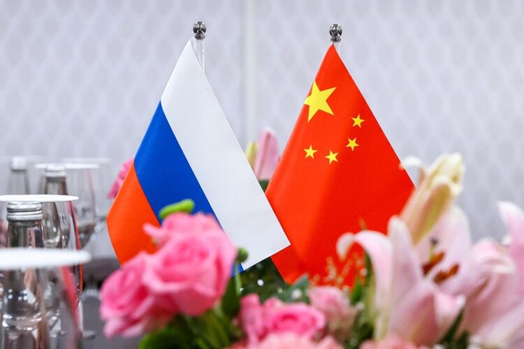 INDIA, NEW DELHI - MARCH 2, 2023: Flags of Russia and China are seen during a meeting between Russia's Minister of Foreign Affairs Lavrov and China's Minister of Foreign Affairs Qin Gang at the Presidential Palace on the sidelines of the 2023 G20 India Summit. Russian Foreign Ministry Press Service/TASS