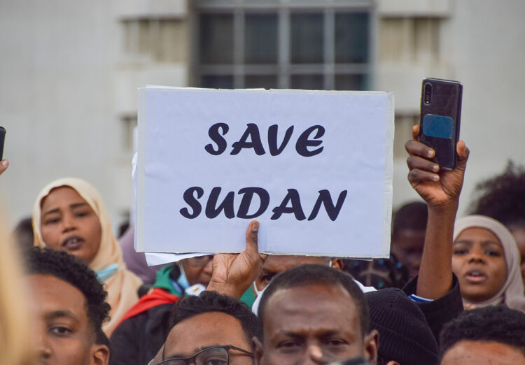 LONDON, UNITED KINGDOM - 2021/10/30: A protester holds a 'Save Sudan' placard during the demonstration. 
Large crowds gathered outside Downing Street in protest against the military coup in Sudan and demanding a return to civilian rule. (Photo by Vuk Valcic/SOPA Images/LightRocket via Getty Images)