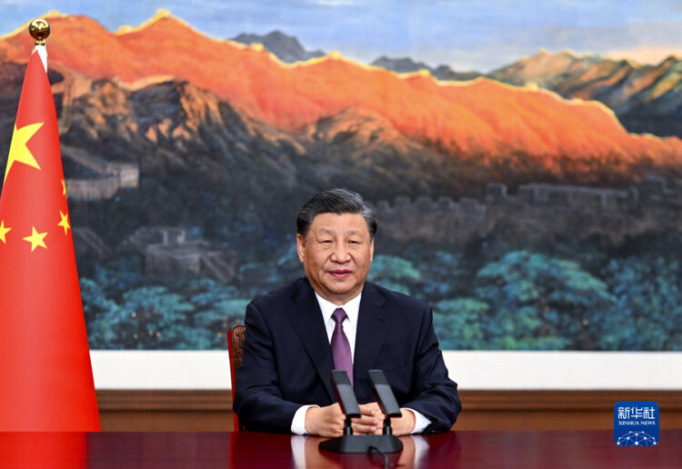Xi