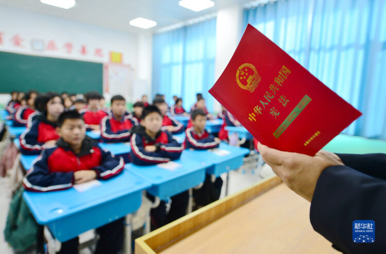 Xi