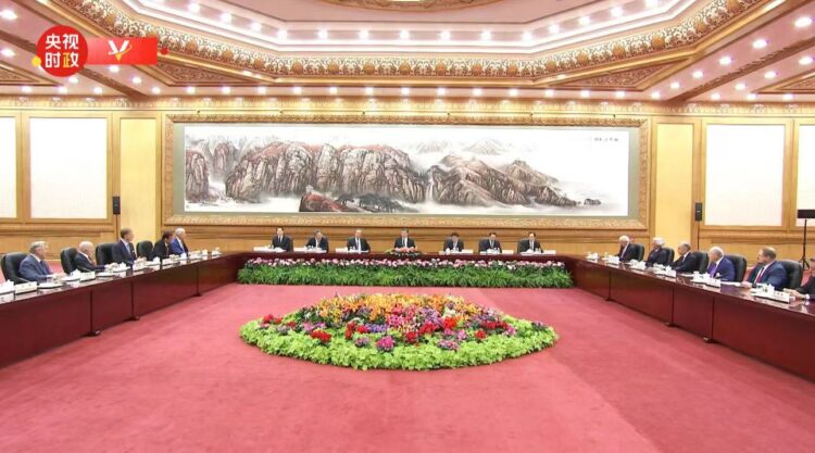 Xi