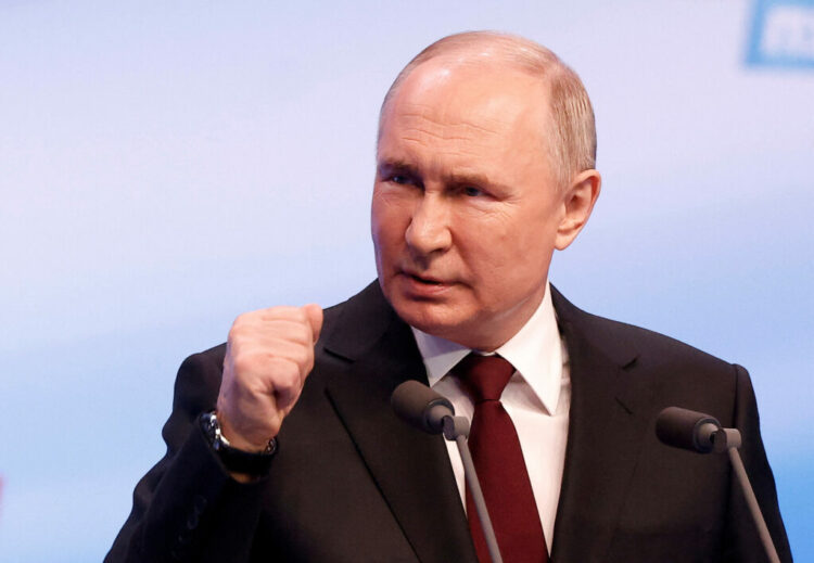 Russian presidential candidate and incumbent President Vladimir Putin speaks after polling stations closed, in Moscow, Russia, March 18, 2024. REUTERS/Maxim Shemetov