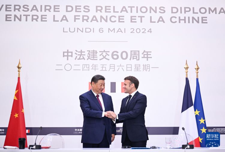Xi