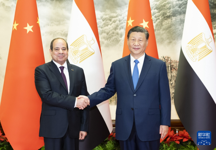 Xi