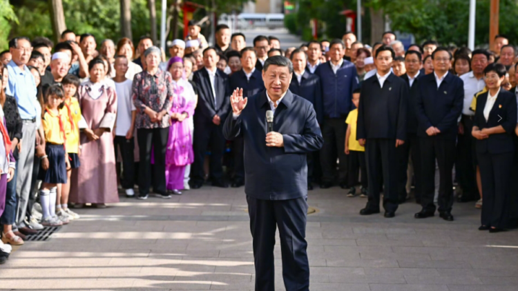 Xi