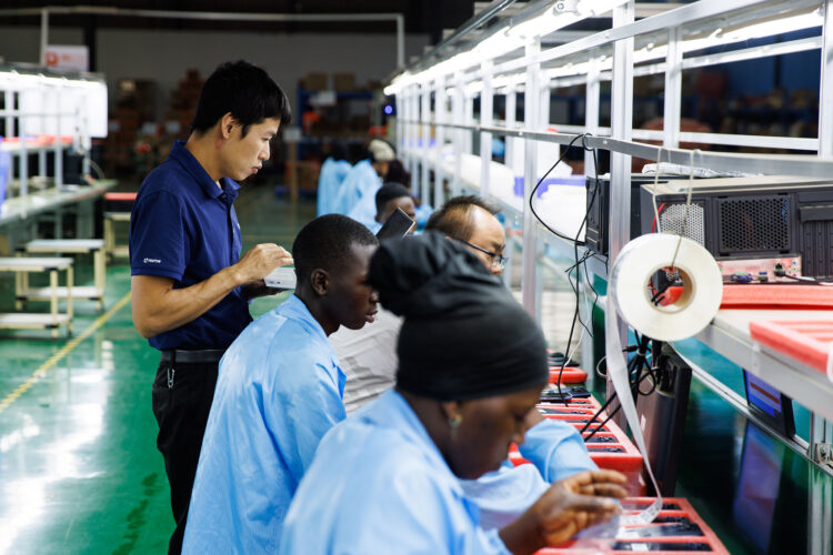 A Chinese worker at the MiOne mobile phone factory in the Sino-Uganda Mbale Industrial Park in Mbale, Uganda, on Wednesday, Jan. 24, 2024. Under Chinese President Xi Jinping’s Belt and Road Initiative, China has extended about $900 billion over the past decade in infrastructure and other projects around the world, including in Africa. Photographer: Luke Dray/Bloomberg
