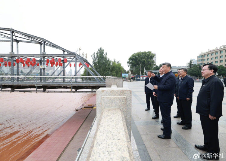 Xi