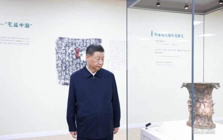Xi
