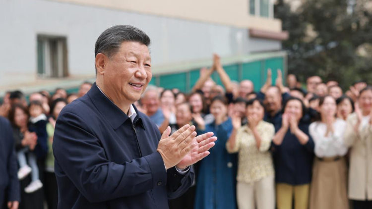 Xi