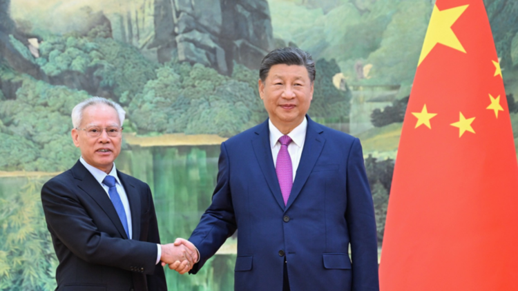 Xi