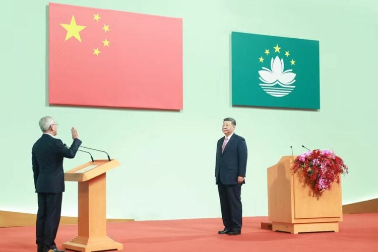 Xi
