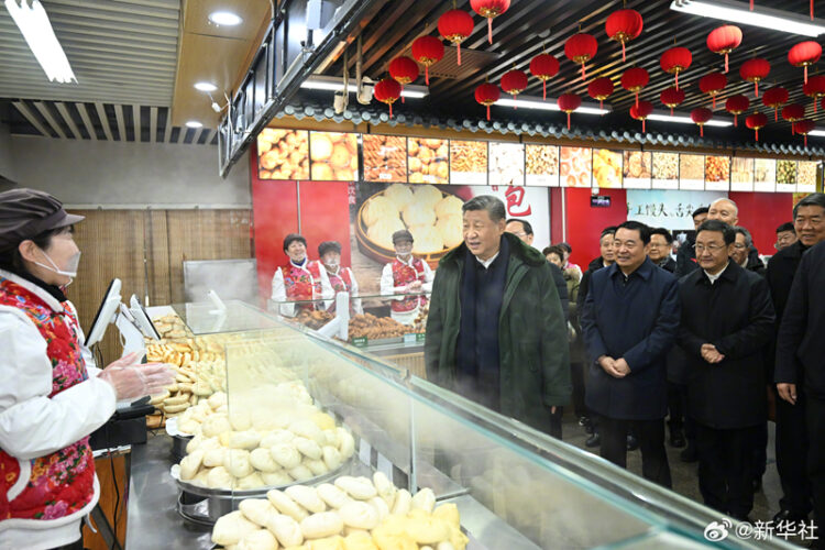 Xi