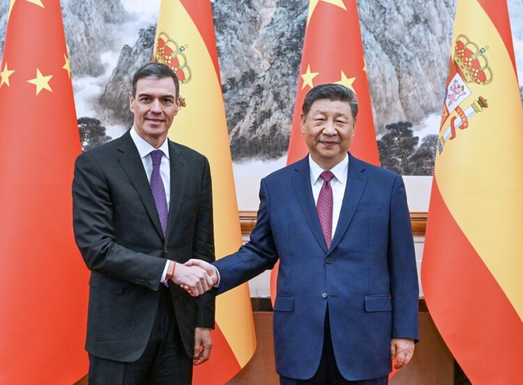 Xi