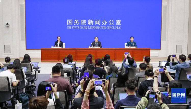 Xi