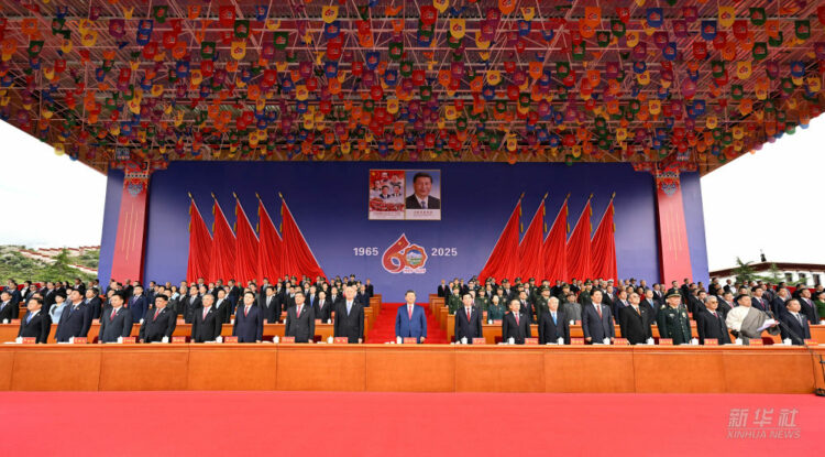 Xi