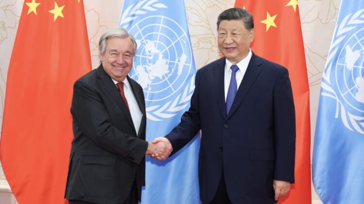Xi