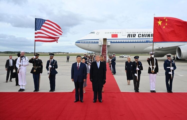 Xi