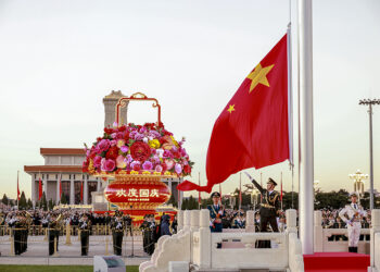 An Yi Bikin Daga Tutar Kasar Sin A Filin Tiananmen Na Beijing Don Murnar Cikar Jamhuriyar Jama’ar Kasar Sin Shekaru 77 Da Kafuwa