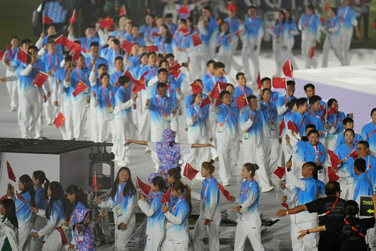 Athletes from China march into the arena during the closing ceremony for the Asian Games in Nagoya, Japan, Sunday, Oct. 4, 2026. (AP Photo/Eugene Hoshiko)